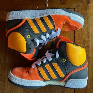 Adidas Women’s mid top orange and gray skate shoes